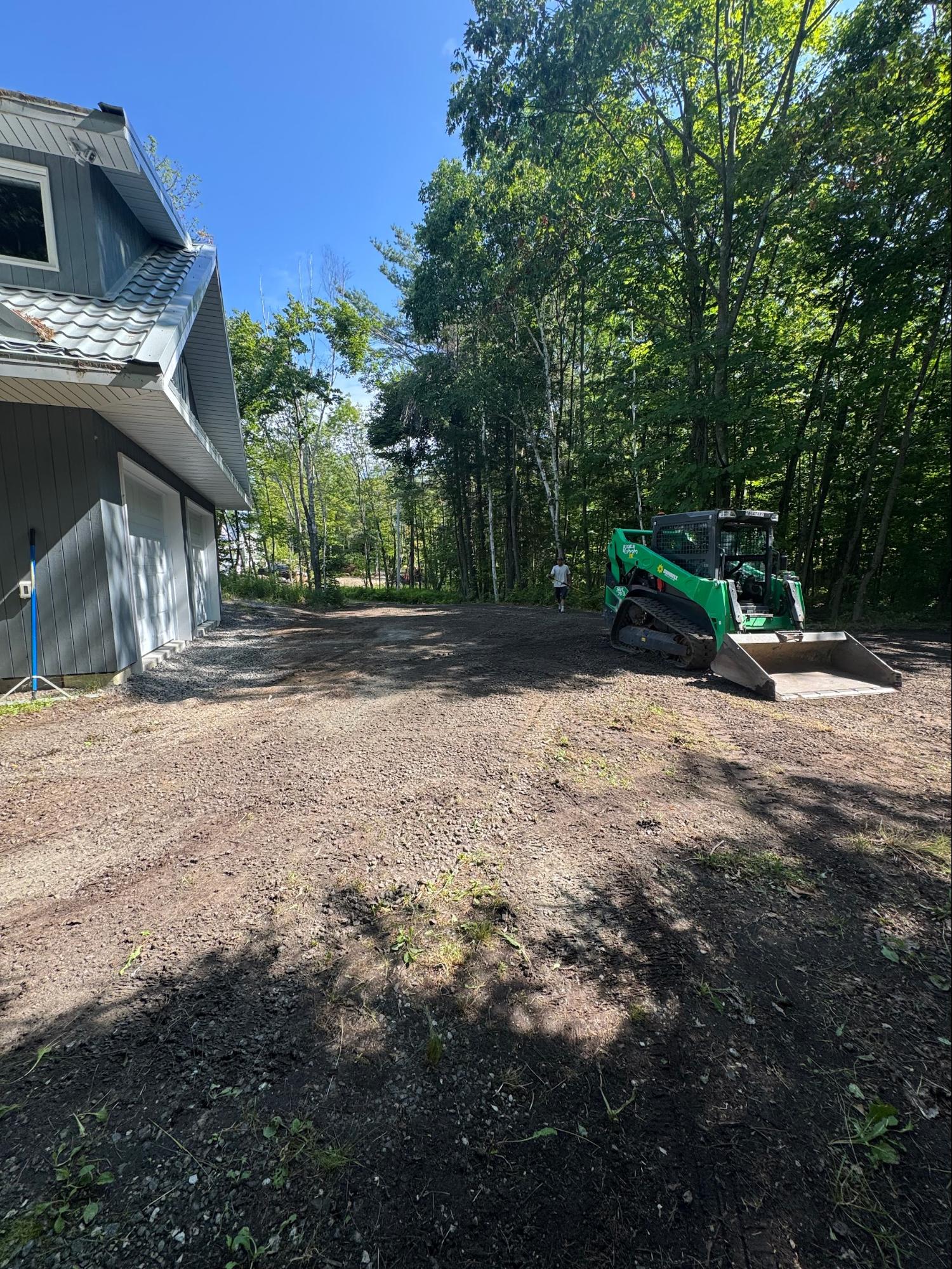 Site grading with skid steer