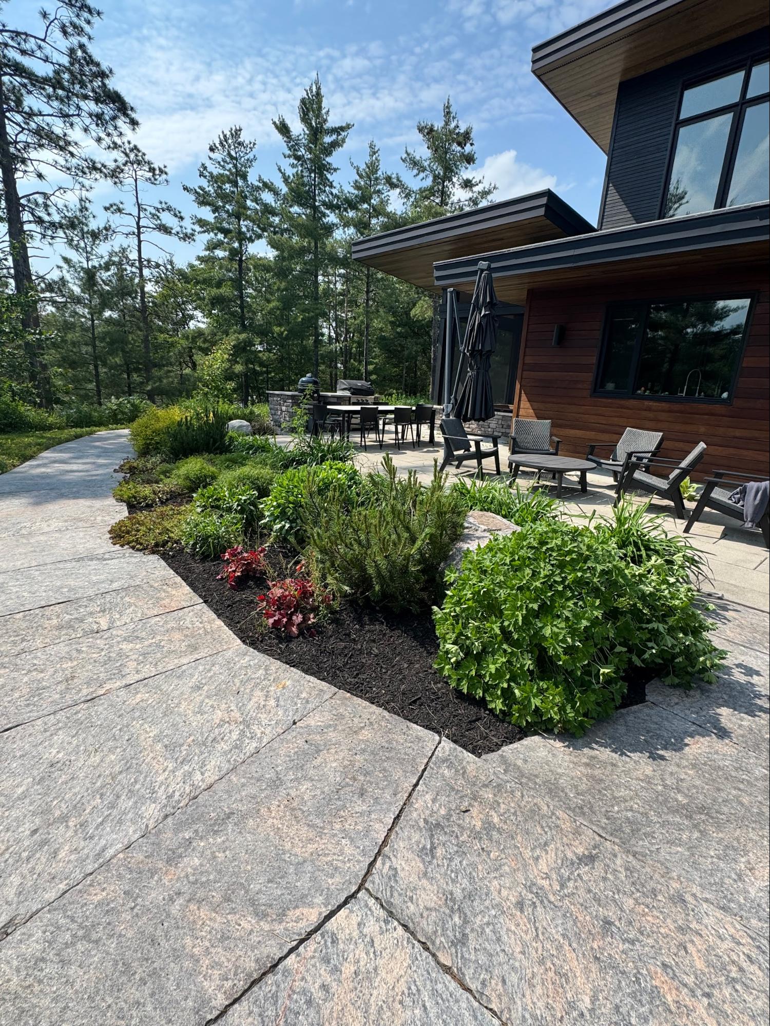 Luxury stone patio with landscaping
